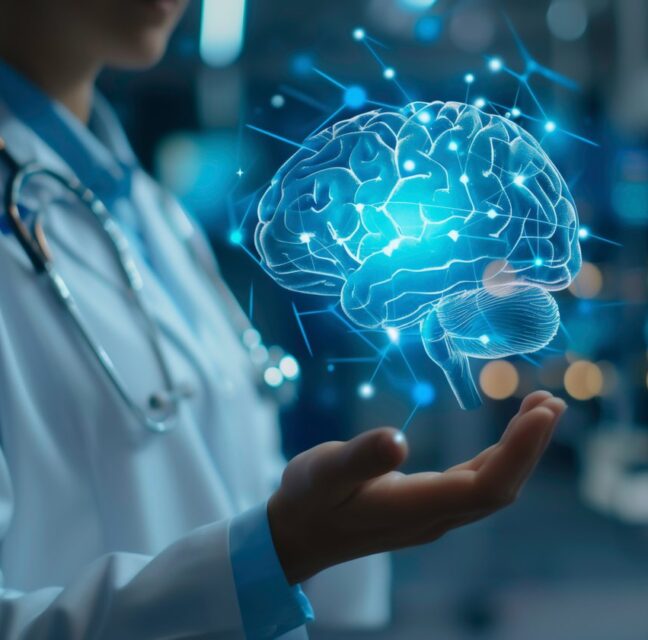 A physician holding a glowing illustration of a human brain